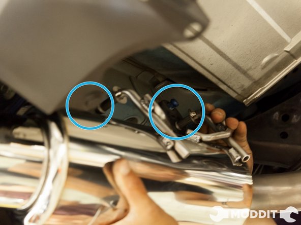 Again reuse the stock exhaust hanger bushings and hang the muffler. Since this a single exit exhaust only the driver side hangers will be used. Again this will act as pivot point for positioning