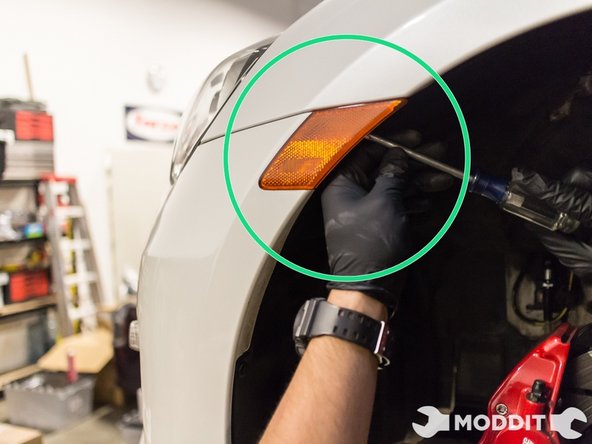 Be aware, one of the clips is located behind the reflector. If you do not pull it out, you might end up ripping something.