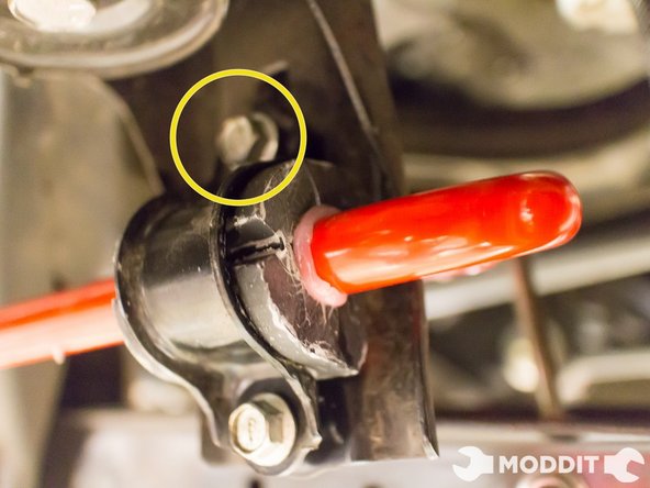 Then proceed to install the upper bolt.