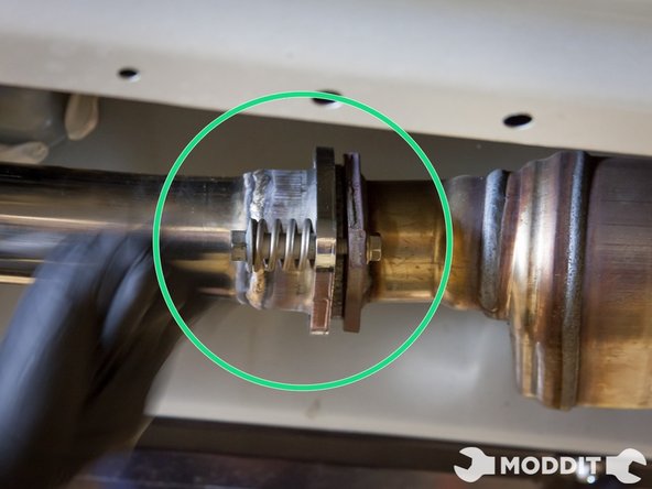 Reusing the hardware (with springs) install the exhaust bolts