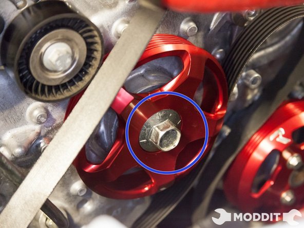 Then line up the crank pulley to the keyway and hand tighten the bolt with the thread locker on the threads into place.