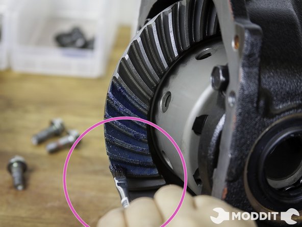 The next few steps are recommended to be done by a professional or at the very least someone with the appropriate tools to measure the backlash, or amount of play before the differential gear starts to contact the Pinion Gear and the contact pattern on the same differential ring and pinion gear.