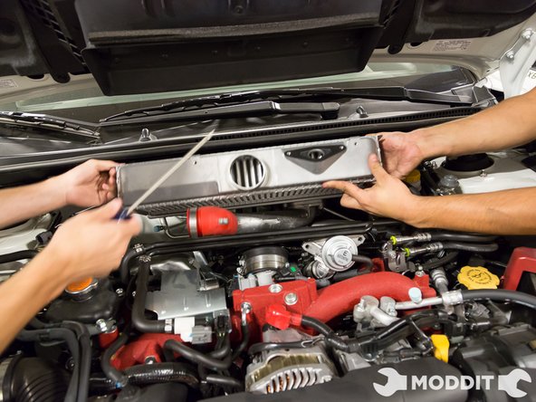 Carefully remove the intercooler some wiggling will be required