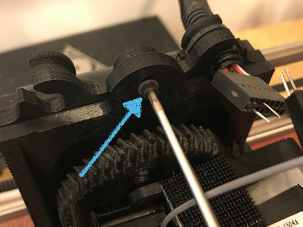 Start by removing the extruder from your printer so we can handle it more easily. Turn off your printer, unplug it from a power source, and ensure the extruder has fully cooled down.