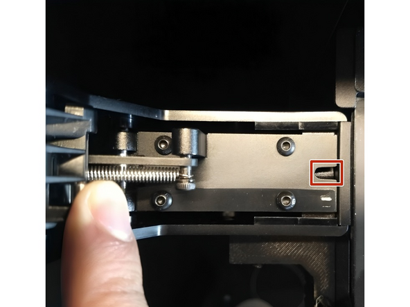 When the densifier swing is moved up, the densifier ram should retract, leaving the hole completely open