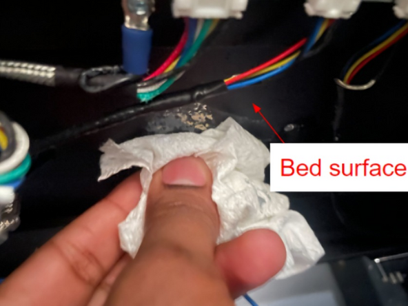 Use the alcohol swab provided in the Snap Disc kit to clean the old thermal paste from the bed surface