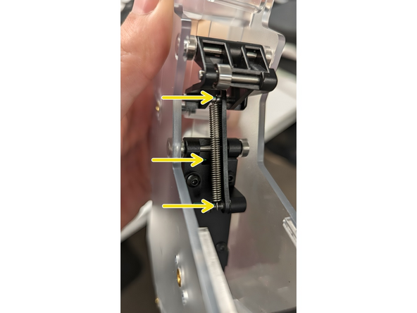 Move the swing up manually and check if the ram retracts fully. If not, apply lubricant (WD-40) to the densifier in the three locations indicated