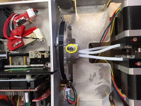 Remove Palette+'s screen by removing the four screws at its corners.