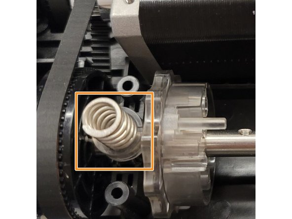 The follower cap has two notches on its bottom side, these notches sit on top of the bearing.