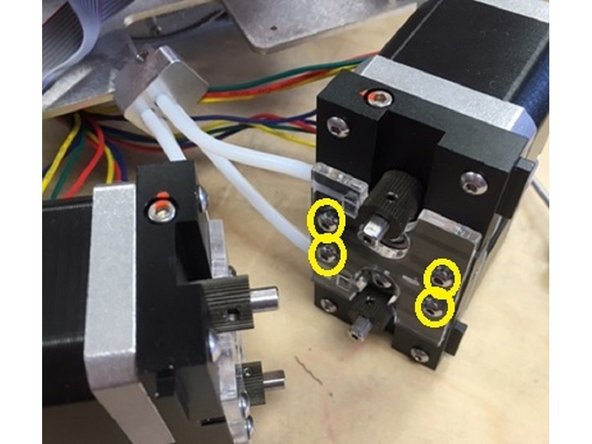 Unfasten the four screws securing Palette+'s top cover to remove.