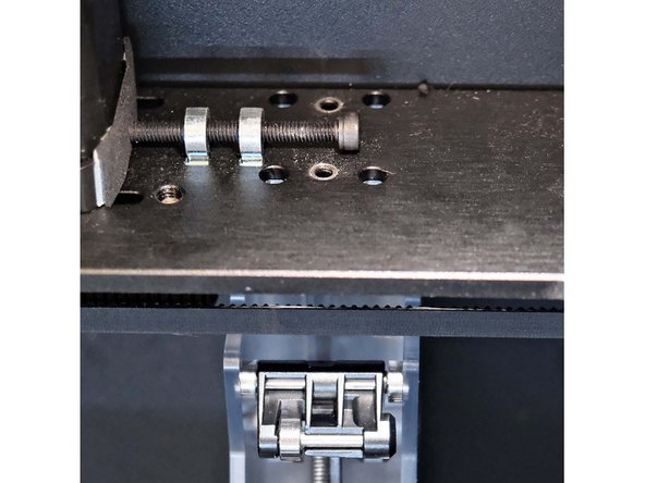 Align and insert the four cylinders into the XY plate and use the fasteners you set aside to secure the TS in place.