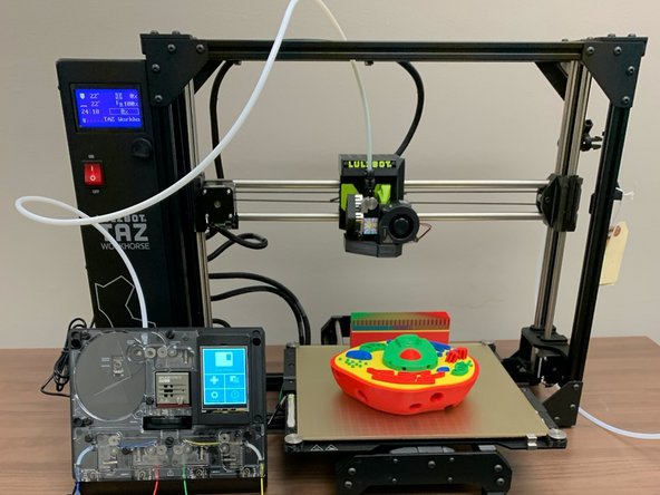 As a bonus step, we have provided bolts and t-nuts (See Bag C: Mounting Hardware from the adaptor) to allow you to attach Palette to your LulzBot Workhorse.
