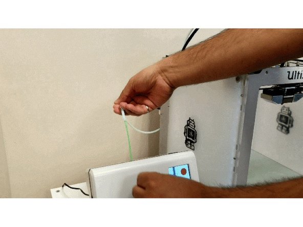 Feed the filament Palette has created into the Palette tube connected to the Ultimaker extruder. Press the filament in until you feel that it has been gripped by the drive gear of the printer. Simply gripping the filament with two fingers is a quick way to check if it is being moved by the extruder and has engaged properly.