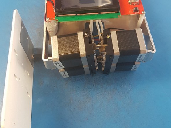 You'll notice that we did not remove the DC barrel nut from the front plate.  You can place the front plate to the side, still attached to the tether.