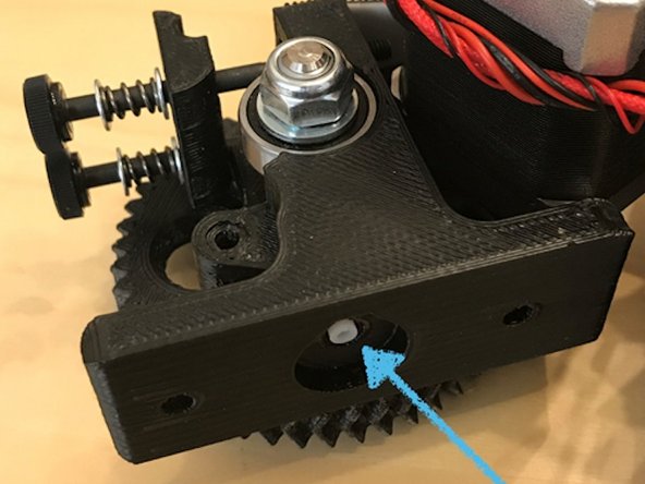 If the PTFE tube cannot easily enter the filament channel, then we may need to expand the inside of the channel (carefully!). The channel should be 4 mm, but sometimes burrs and printing imperfections make the channel's diameter slightly less than 4 mm. The conversion kit includes a 4 mm deburring bit to help solve this problem.