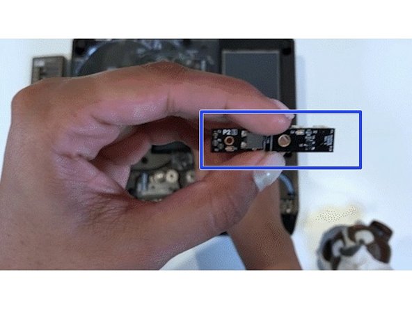 Unscrew and unplug the existing homing switch. 