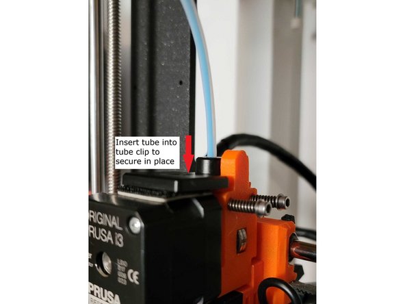 As filament is being driven to the nozzle, it will cause the tube to move closer to the clip closing the gap. This will allow it to be inserted into the hole without putting excessive pressure on the filament.