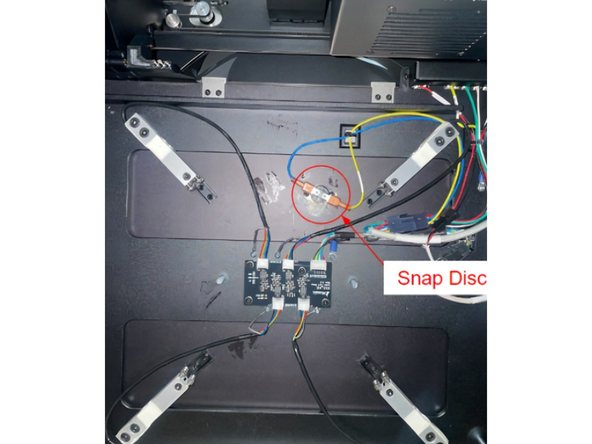 Remove 2 x M3 button heads and 2 x M3 washers that are used to install the Snap  Disc