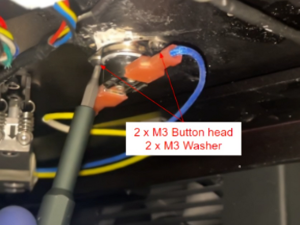 Fasten the Snap Disc back into its original position using the 2 x M3  buttonheads and 2 x M3 washers