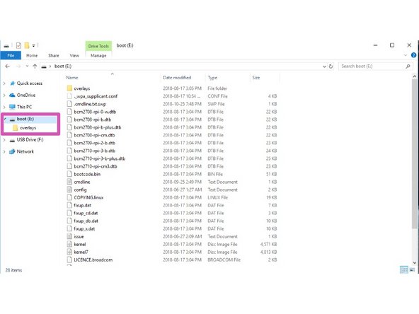 Insert the microSD card into your computer. An adapter may be necessary.