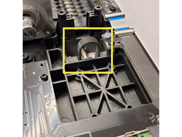 View of the belt from the bottom side of the unit, where the motor is.