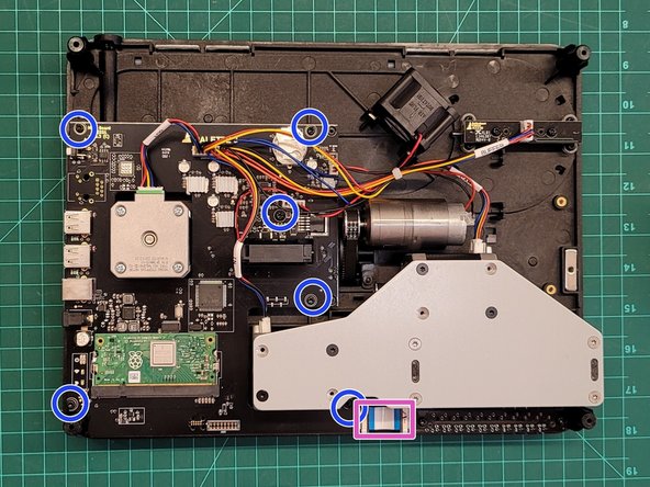 Remove the main board following the steps here.