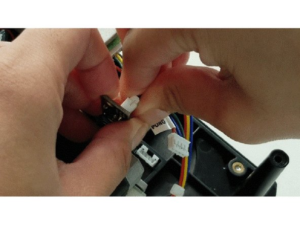 Remove the 2 screws holding the encoder and detach the scroll wheel (&quot;SW&quot;) and &quot;Pong&quot; wire bundle.