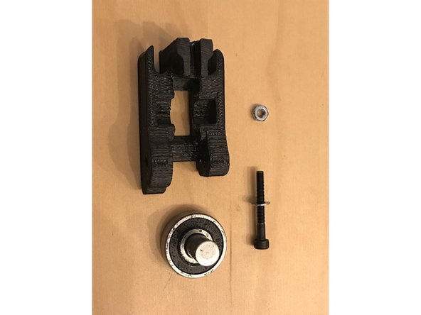 Now that you've separated the parts, reinstall the idler bearing and nut into the new 3D printed structure you printed.
