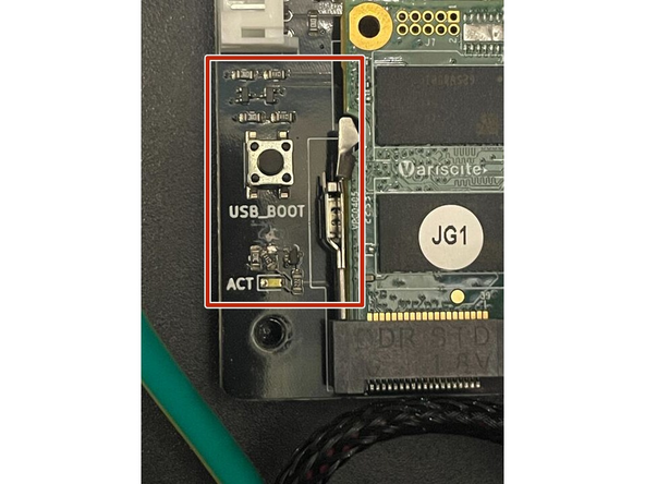 Gently screw the new CPU cooling shroud onto the mainboard