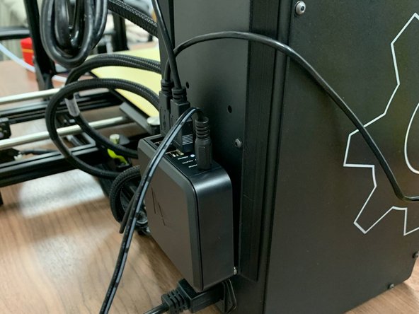 Follow the instructions provided in the manual with the Canvas Hub. It is recommended to mount the Canvas Hub using the provided velcro tabs to the back of the printer so that it is out of the way of the filament. It is also recommended to bundle the wires above the Canvas Hub to ensure that they are tidy and out of the way of any moving parts. 