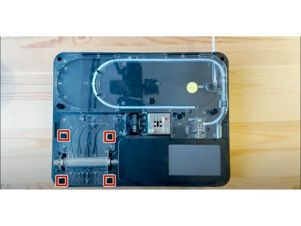 Remove outgoing cover by undoing the thumbscrews holding it in place.