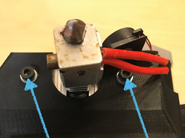 Then, using a hex key (Allen key), remove the bolts from the fan.
