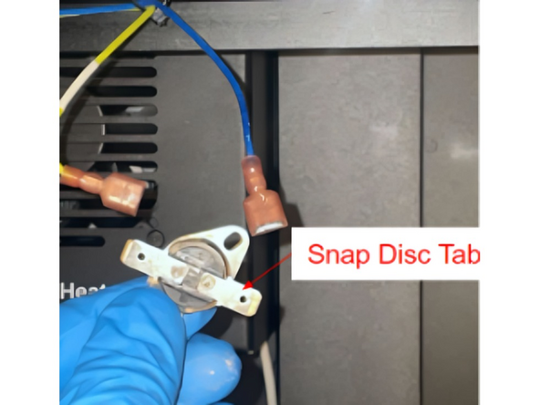 Insert one connector onto the new Snap Disc tab, ensuring the flat side is facing the  bottom of the Snap Disc