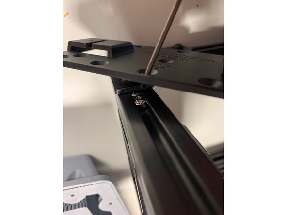 Tighten both screws ensuring that the plate is level and flush to the extrusion.