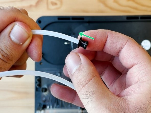 Install the collet onto the new PTFE tube and then the brass retainer.