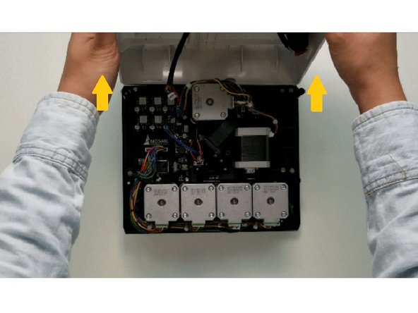 The substructure is connected to the bottom casing by a bundle of wires. Slowly and carefully lift the casing from the bottom up while ensuring that the wire bundle is not pulled abruptly.