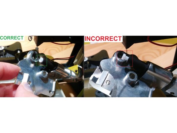 Ensure that you do not strain the wires connecting the hot end to the print head during this process as excessive force could cause damage.