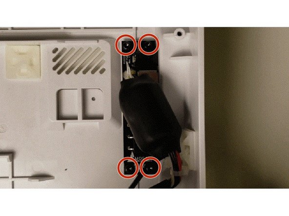 Unscrew the four bolts from the I/O board.