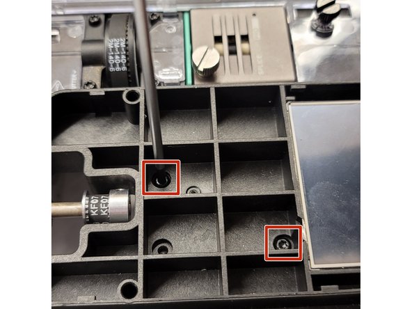 Release motor by loosening these screws to the right of the ingoing drive gear shaft, inside the screen bezel