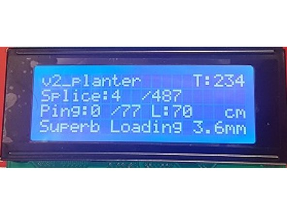 After a short time, Palette will ask for you to push the magnet towards your Palette. You'll notice that this action causes filament to move through your Teflon tube towards your Scroll Wheel.  