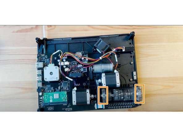 Then remove the 4 screws holding the CAM in place.