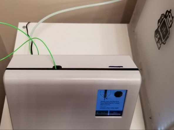 Follow the onscreen instructions to clear the outgoing tube which you would have already completed in step 3. Load filament into the inputs, making sure not to clear filament for any inputs as clear filament is used later in the calibration process. Allow Palette 2 to output filament with the outgoing tube disconnected.
