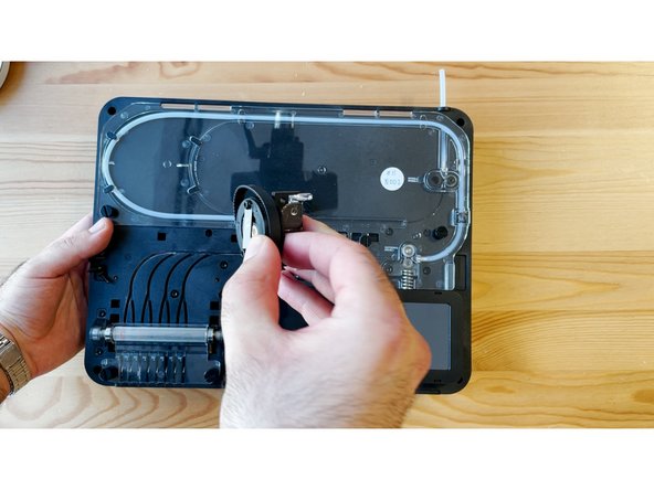 Lift the old cutter wheel assembly from the substructure. Set the cutter belt aside.