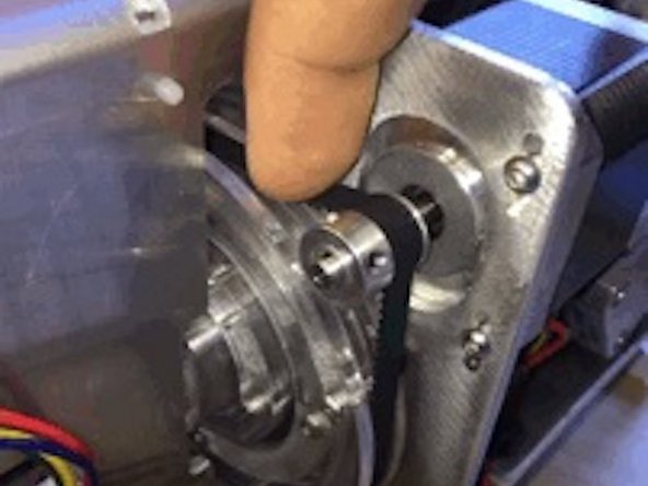 Once the screen portion is replaced, tighten the tension of the belt by moving the motor along the tracks.  You can slide the motor up to tighten the belt tension, or lower the motor to loosen the belt tension.