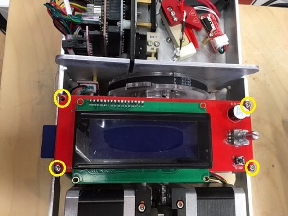 Unfasten the four screws securing Palette+'s top cover to remove.