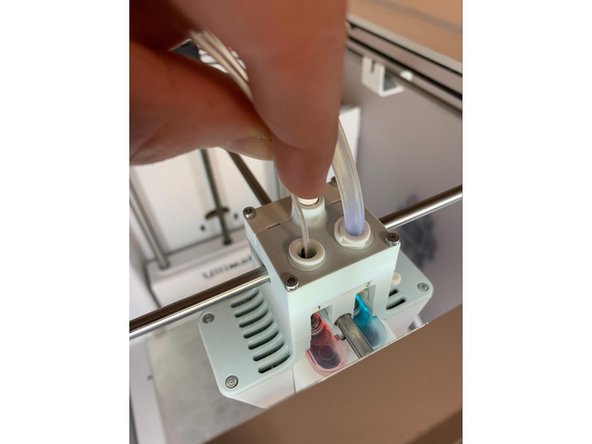 Using the Ultimaker menu, heat up the hotend by selecting Printer icon &gt; No material &gt; 3 Dot Icon &gt; Move. This will heat the print head. Wait 2 minutes for the print core to heat to 200C.