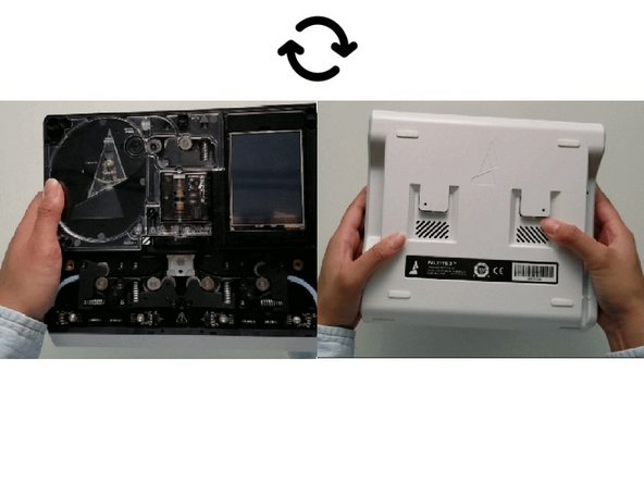 Once the screws are removed, grip Palette 2 together by the substructure and bottom casing together and flip so that the screen is facing down.