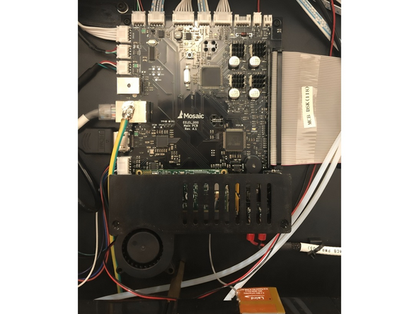 Remove the zip tie securing the fan cables