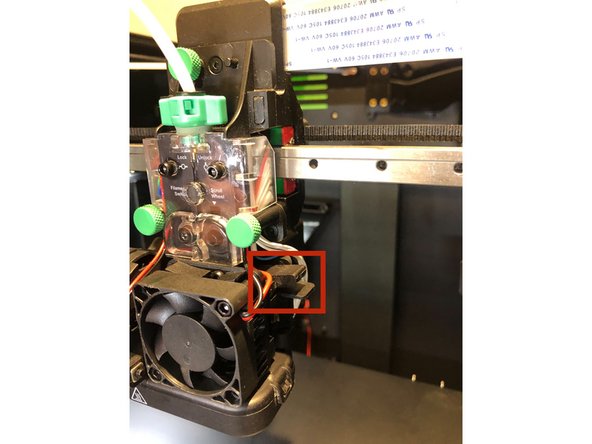 Heat the nozzle to the temperature of the filament inside, or slightly over. Manually insert a piece of filament into the Print Head, and push it down into the Hot End. Let it sit there for a minute.