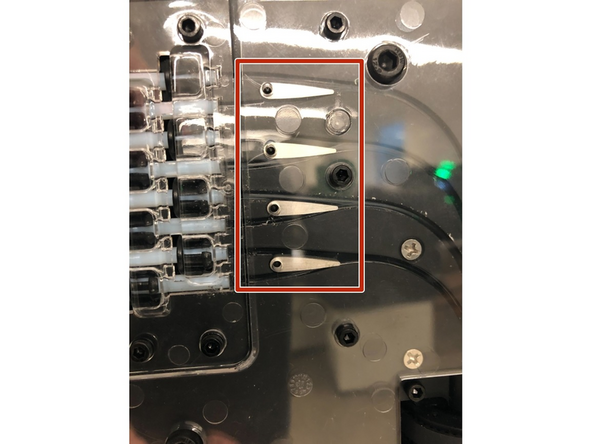 Next, inspect for obstructions in Palette X. Take off the Palette X cover using the thumbscrews, and inspect for any filament caught in any of the channels using a flashlight